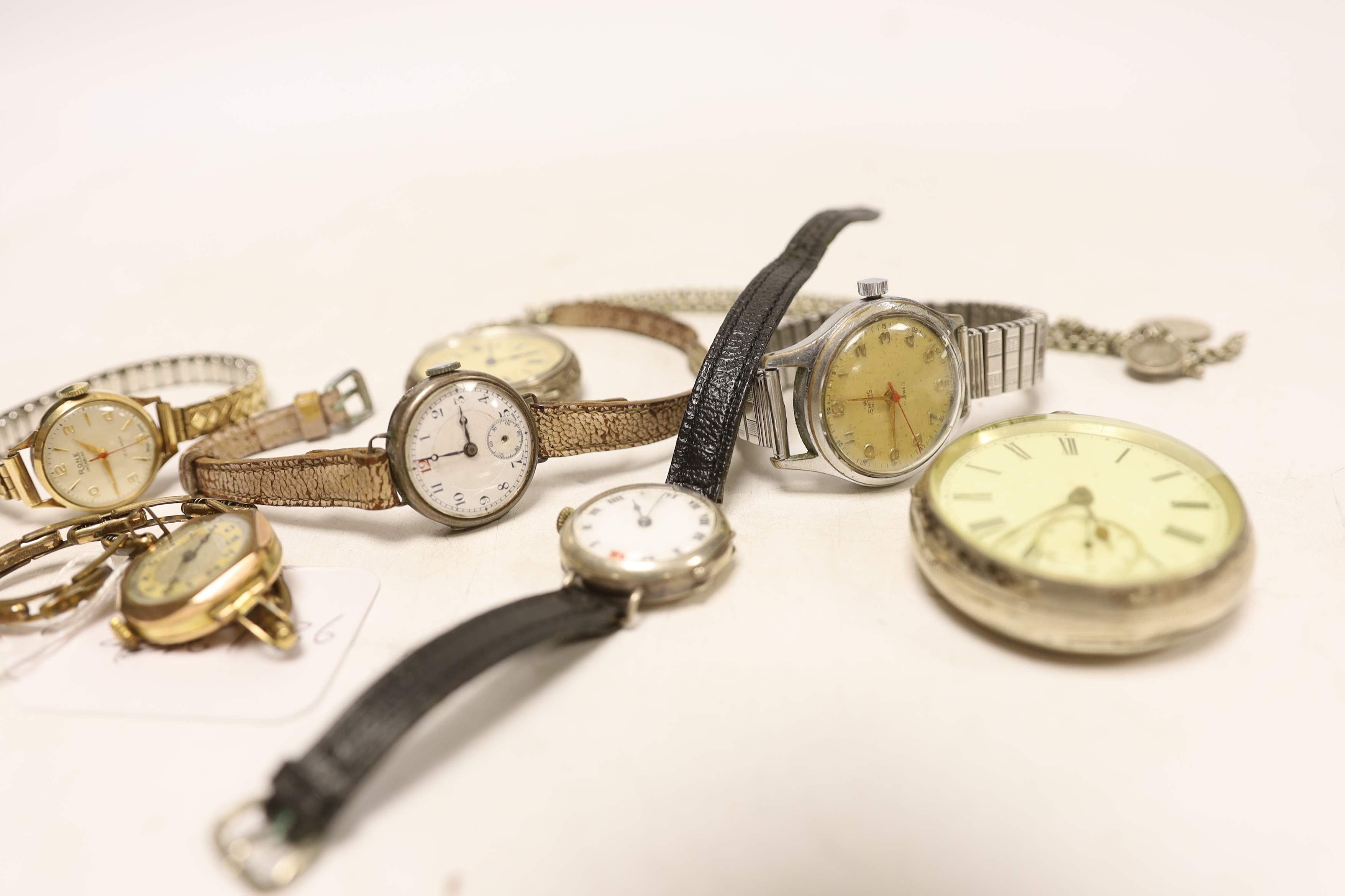 Two 9ct gold cased manual wind wrist watches including a Rone and five other assorted watches.